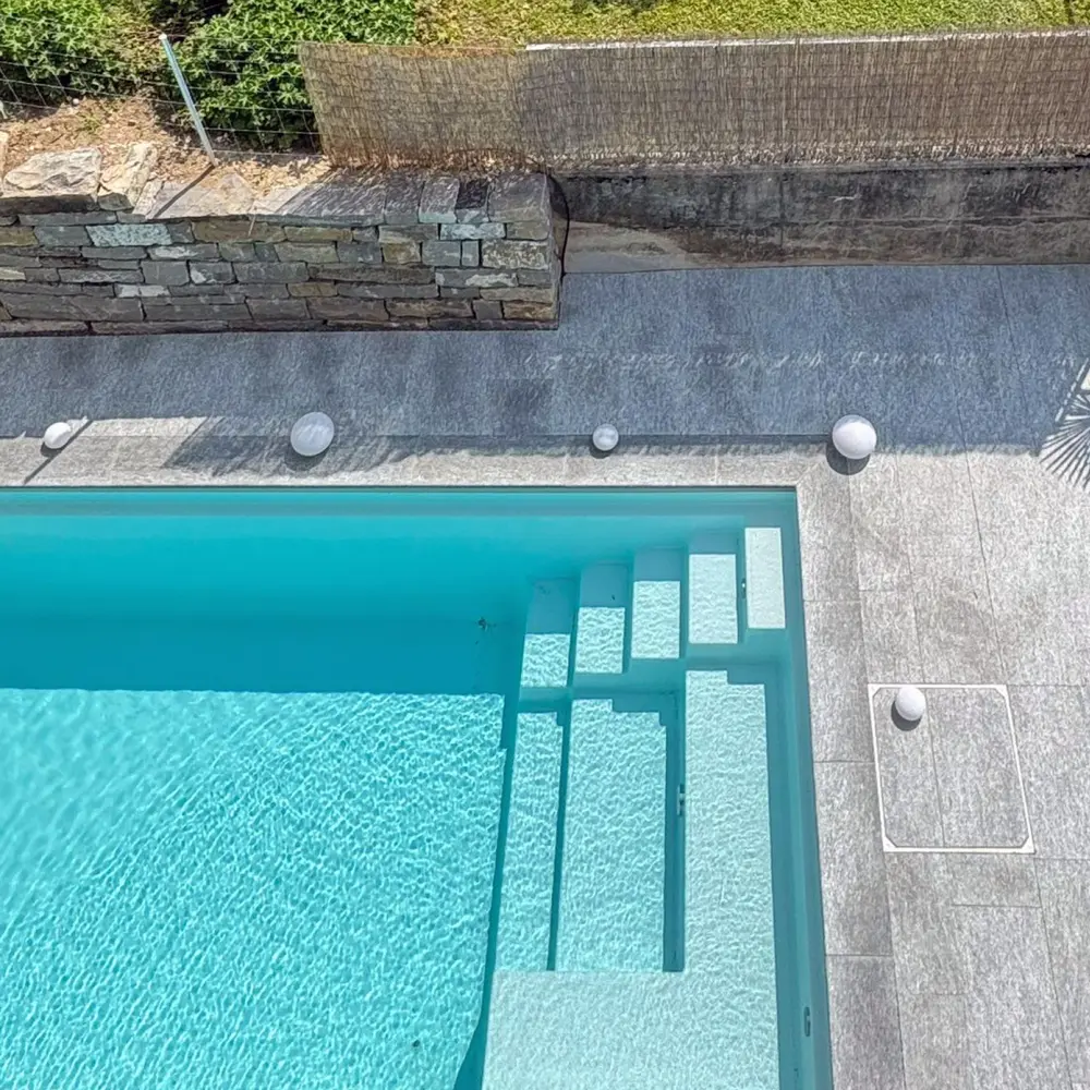 Gartenbau_jangarten_Pool_Swimmingpool_Naturstein_Trockensteinmauer_Region-Bern