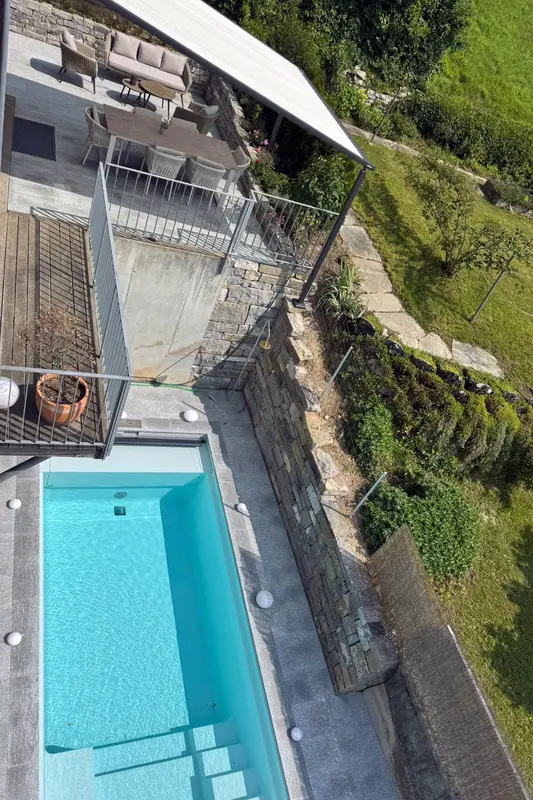 Gartenbau_jangarten_Swimmingpool_Natursteinplatten_Guemligen